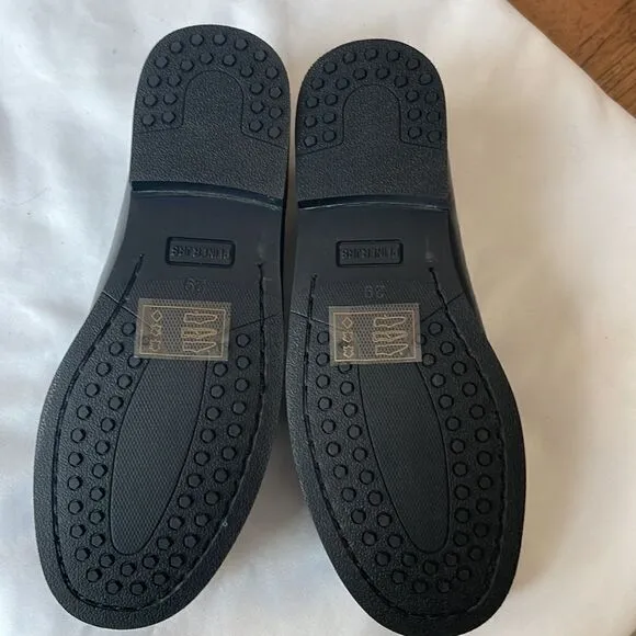 PLINER JRS BLACK LEATHER LOAFERS.  METAL/LEATHER BUCKLE DETAILS.  NEW IN…